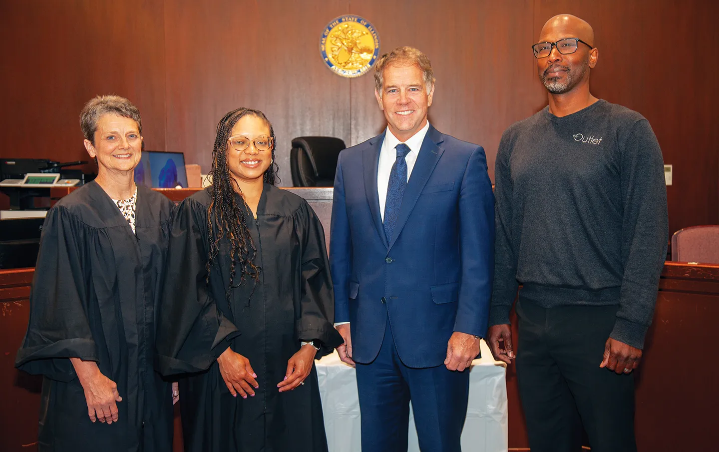 Associate Judge Karen Tharp, Associate Judge Sierra Senor-Moore, Sangamon County State’s Attorney John Milhiser and The Outlet executive director Michael Phelon